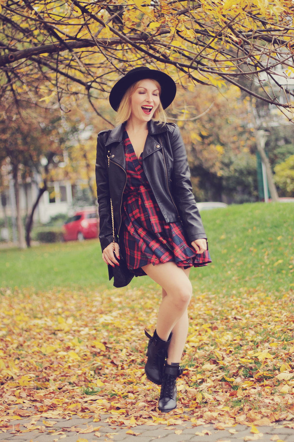 fall outfit tartan dress and leather jacket