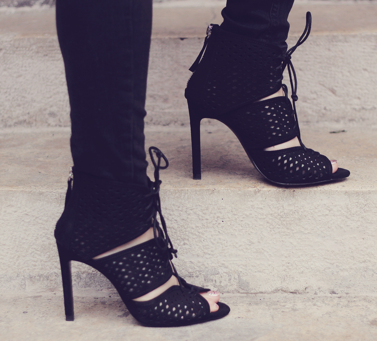 black cut high-heeled sandals