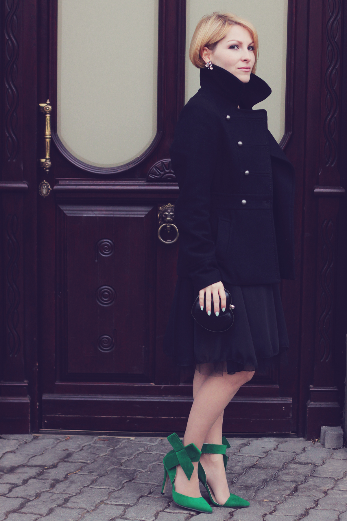 holiday look-black coat and dress with big bow high heel stilettos