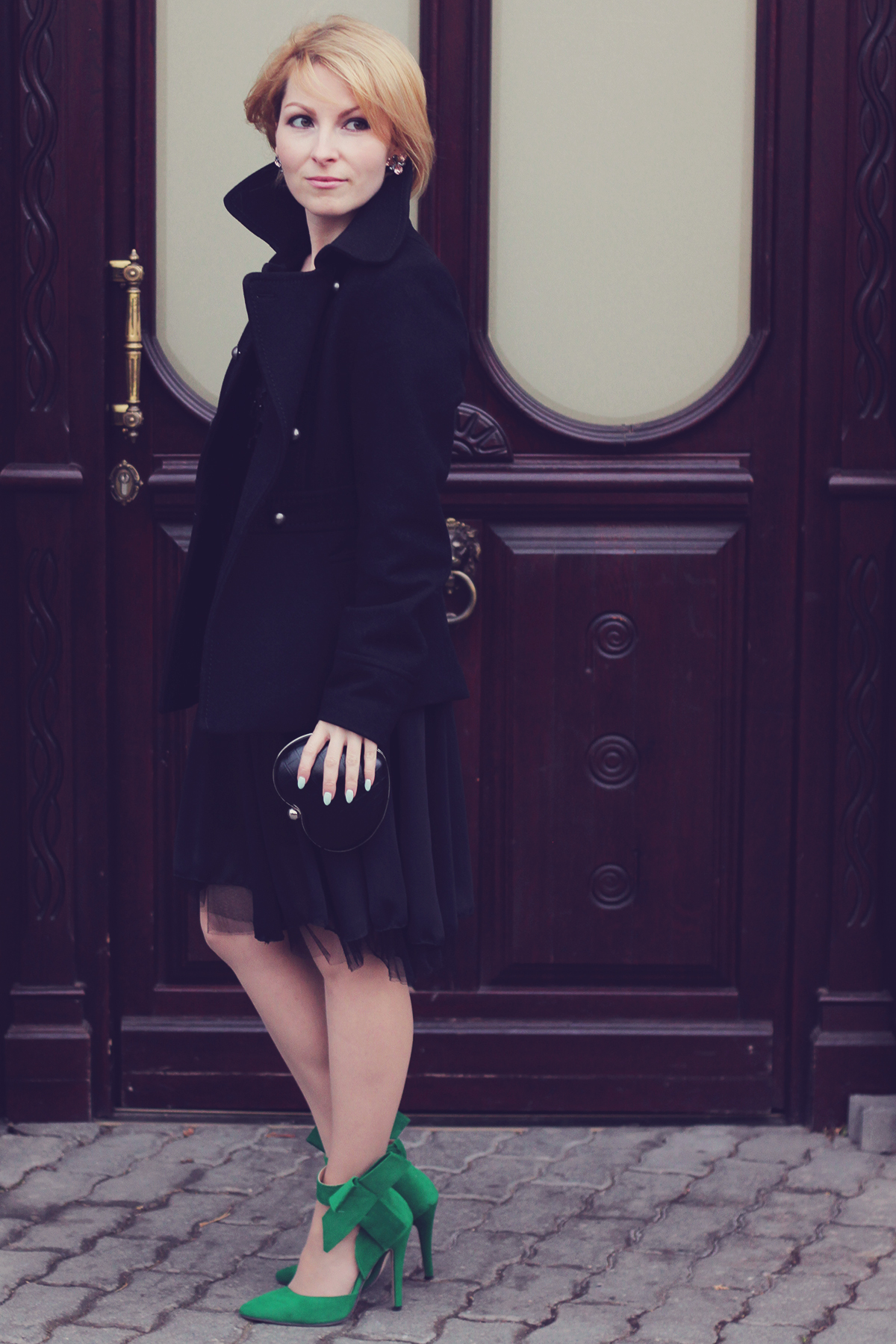 holiday look-black dress and coat with the big bow high heel stilettos