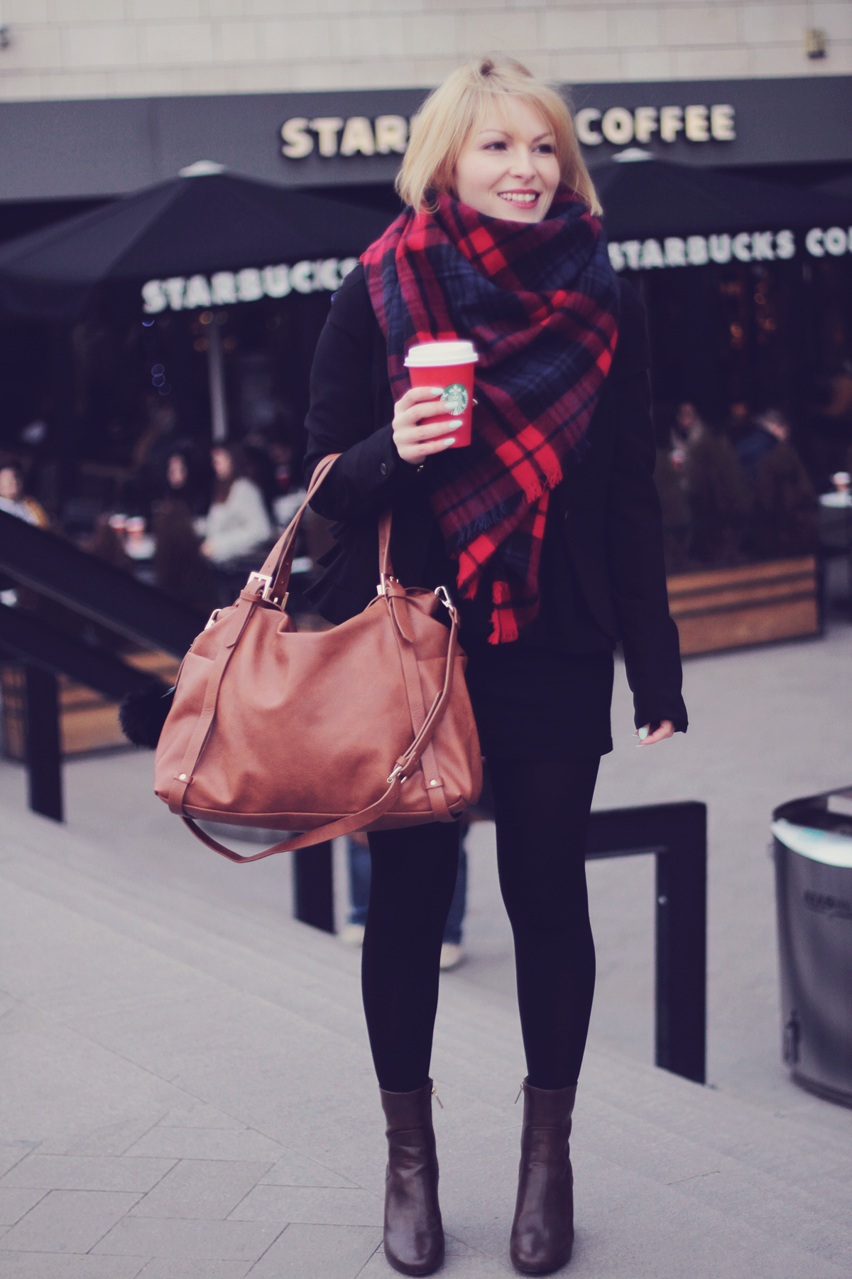 the tartan scarf and brown tote bag