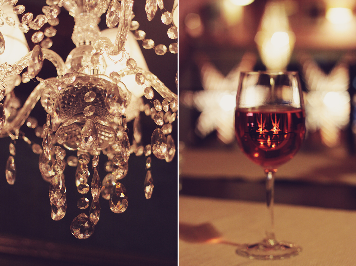 chandelier and glass of wine - szeged hungary