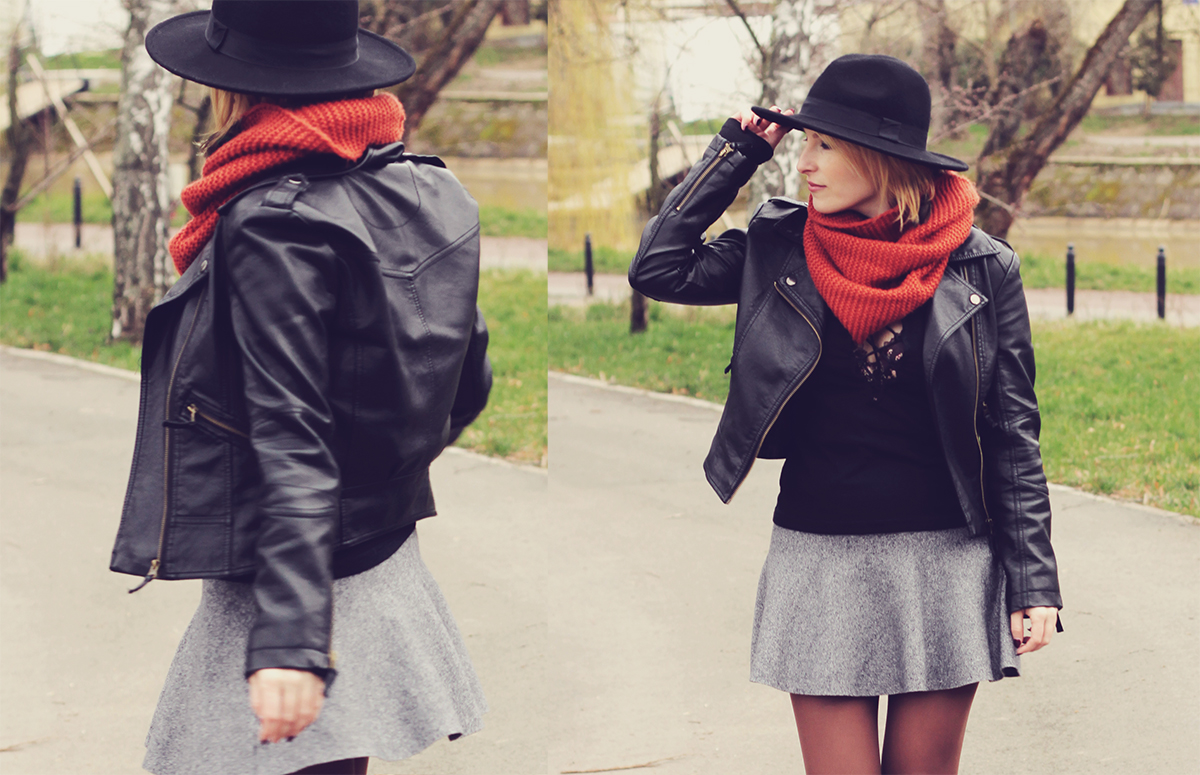 faux-leather jacket and grey skirt