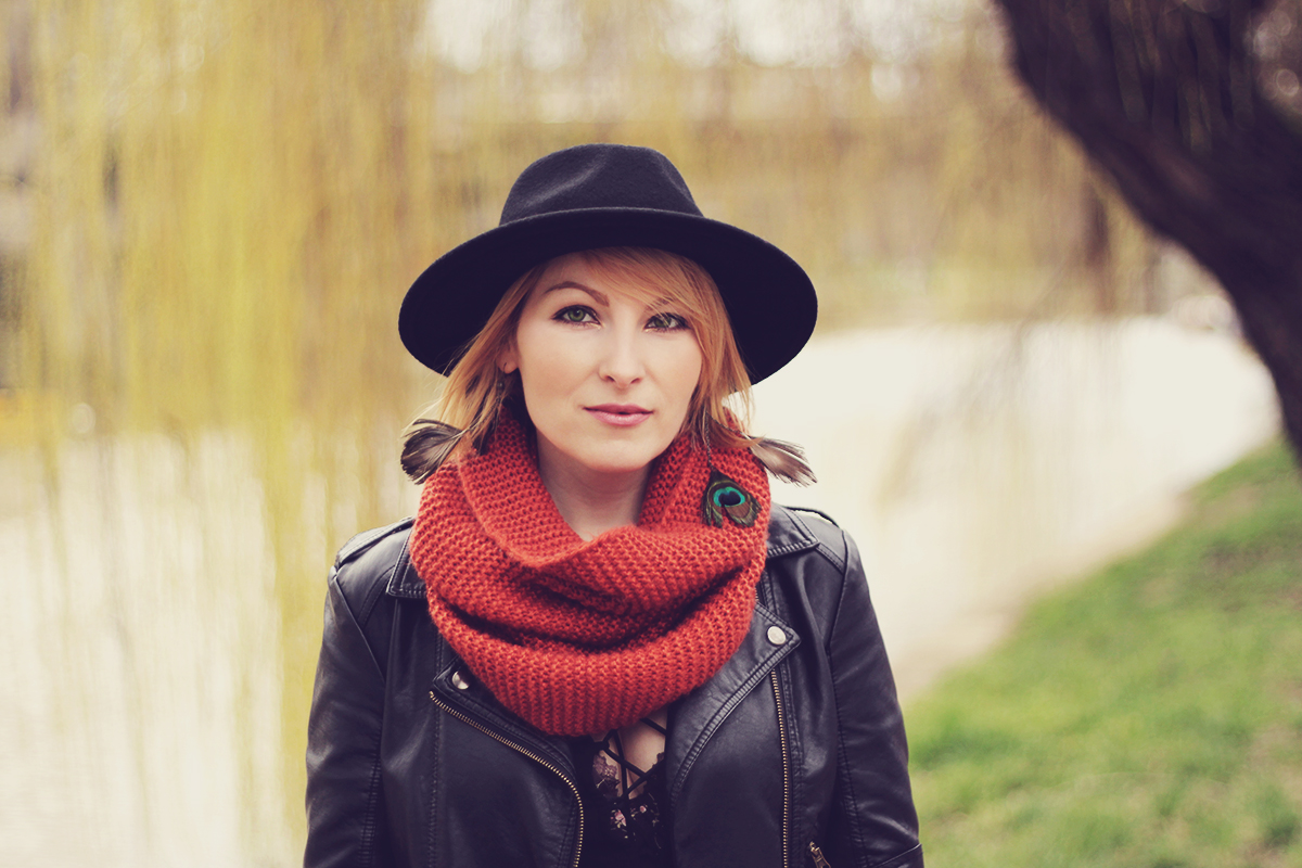 wool hat and faux-leather jacket