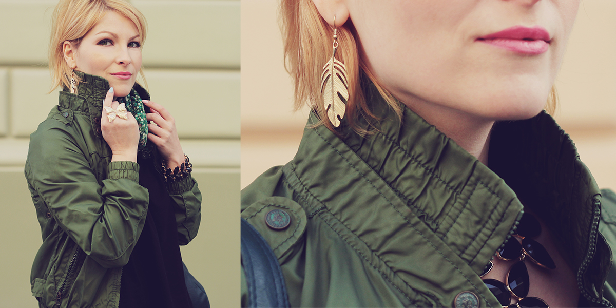green bomber jacket and feather gold earrings