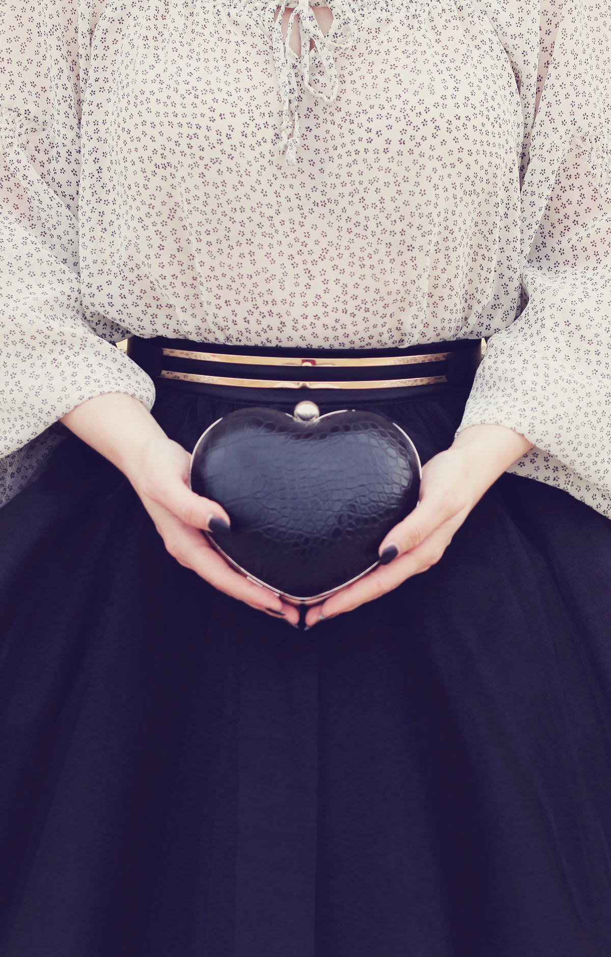 the tulle skirt and heart shaped clutch