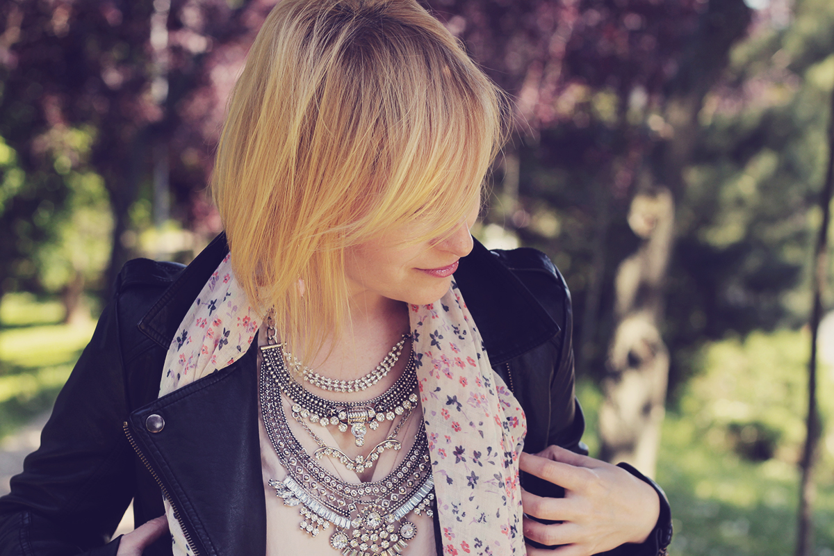 statement necklace and faux leather jacket