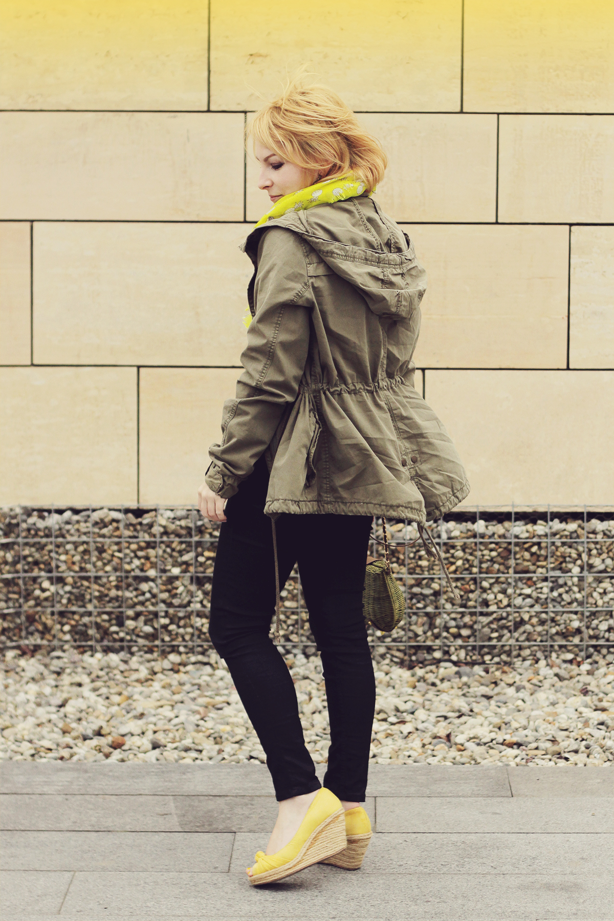 yellow wedges and parka jacket