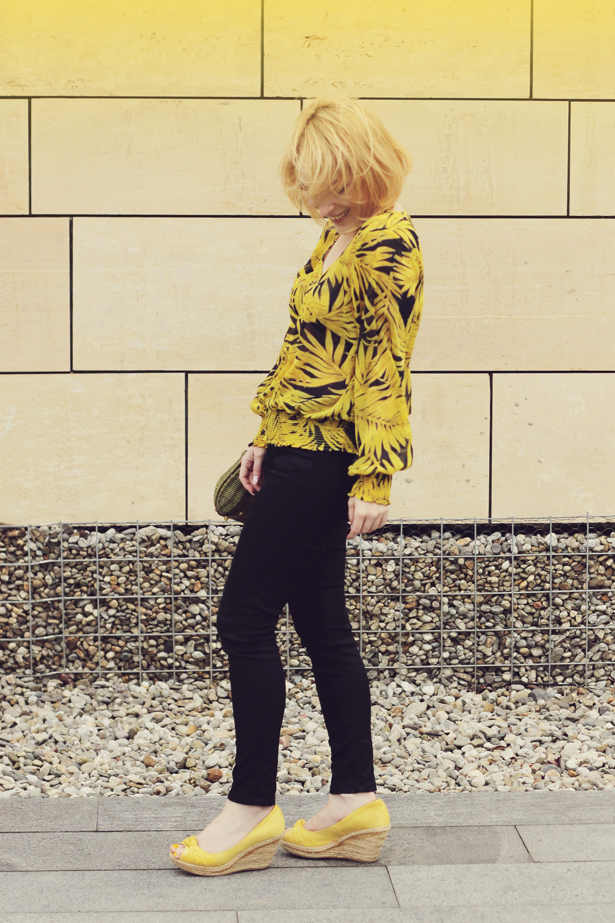 yellow wedges and yellow pattern blouse