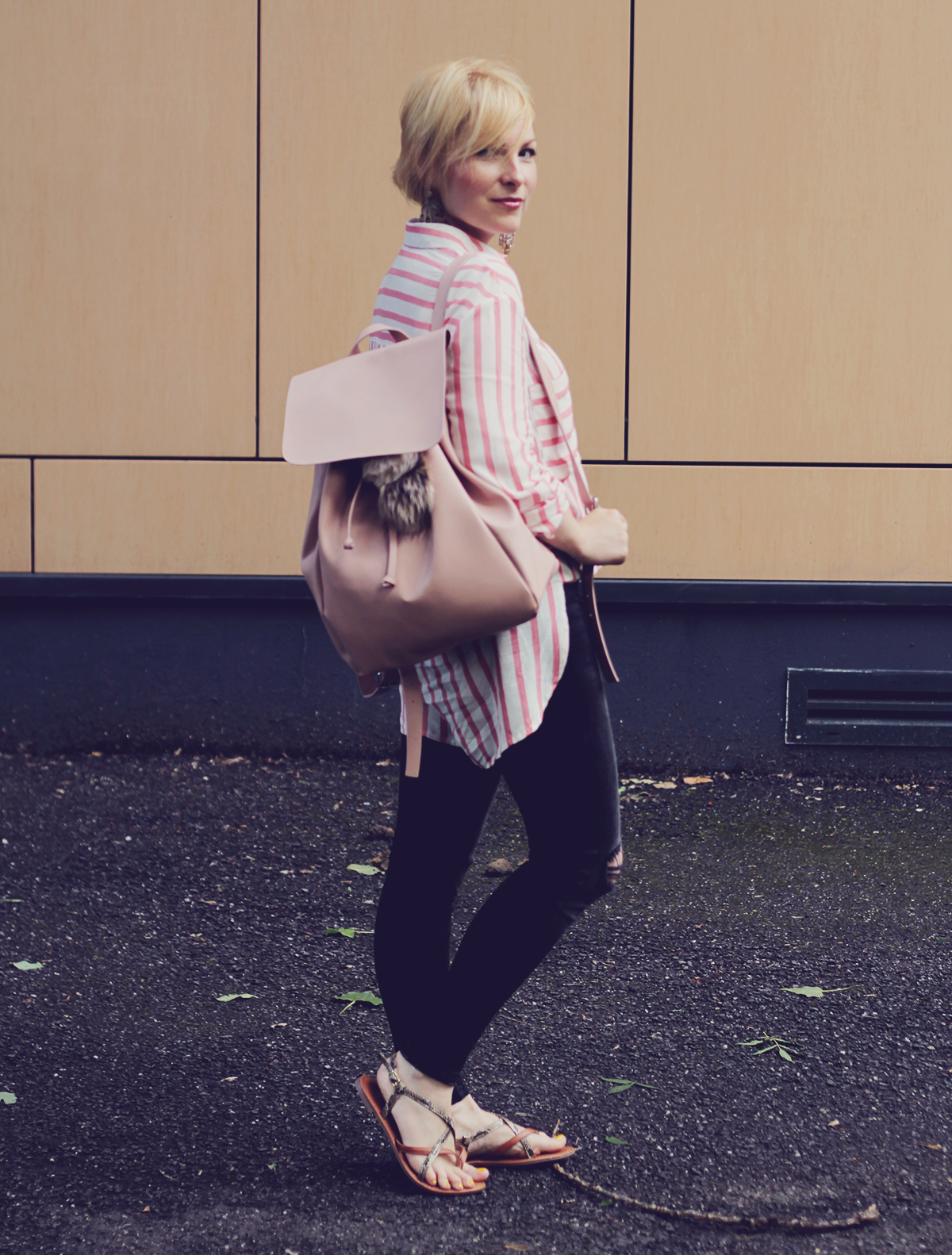 pink backpack and oversized pink stripe shirt