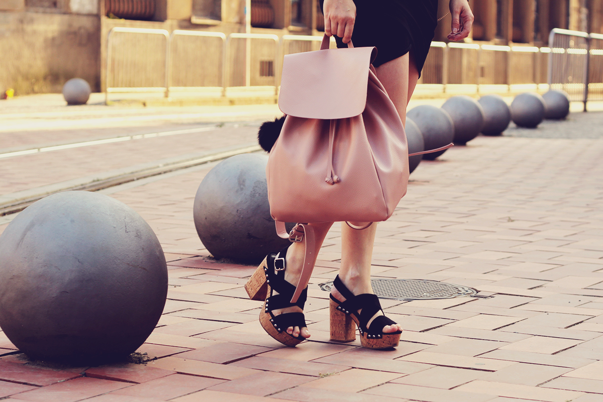 retro platforms and pink backpack