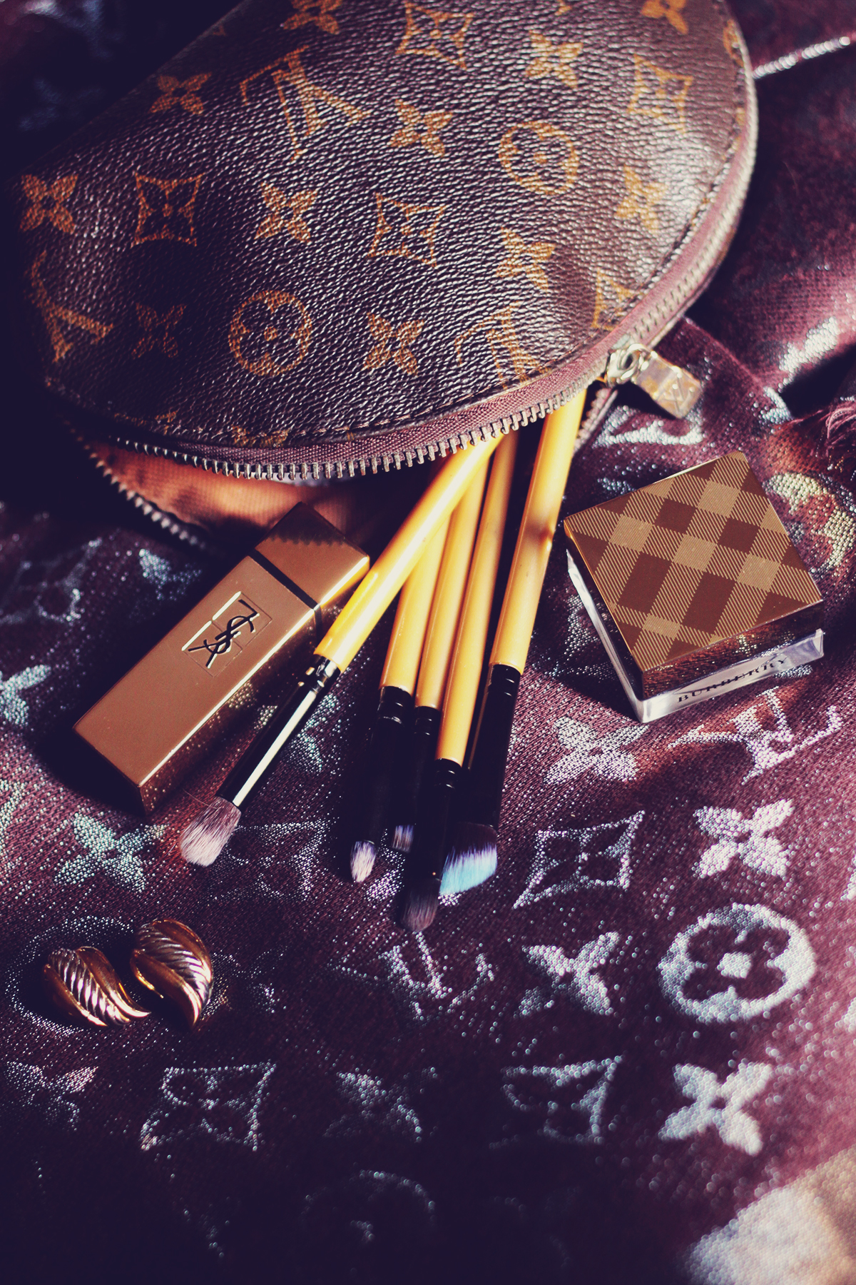 louis vuitton monogram brown and silver scarf, louis vuitton make-up pouch, YSL lipstick, burberry highlighter, make-up brushes, burberry vintage stud earrings