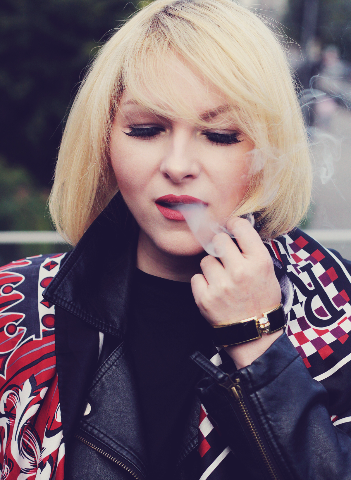rock chic look, rock'n'roll, edgy look, Jean Paul Gaultier scarf, smoking, black leather jacket, Alexander McQueen bracelet, smoke coming out of mouth, make-up