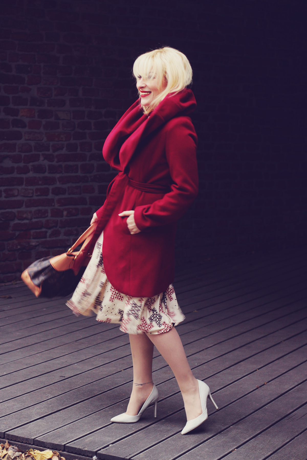 winter fashion, christmas party look, louis vuitton bag, red coat, pattern dress, white heels, red lipstick