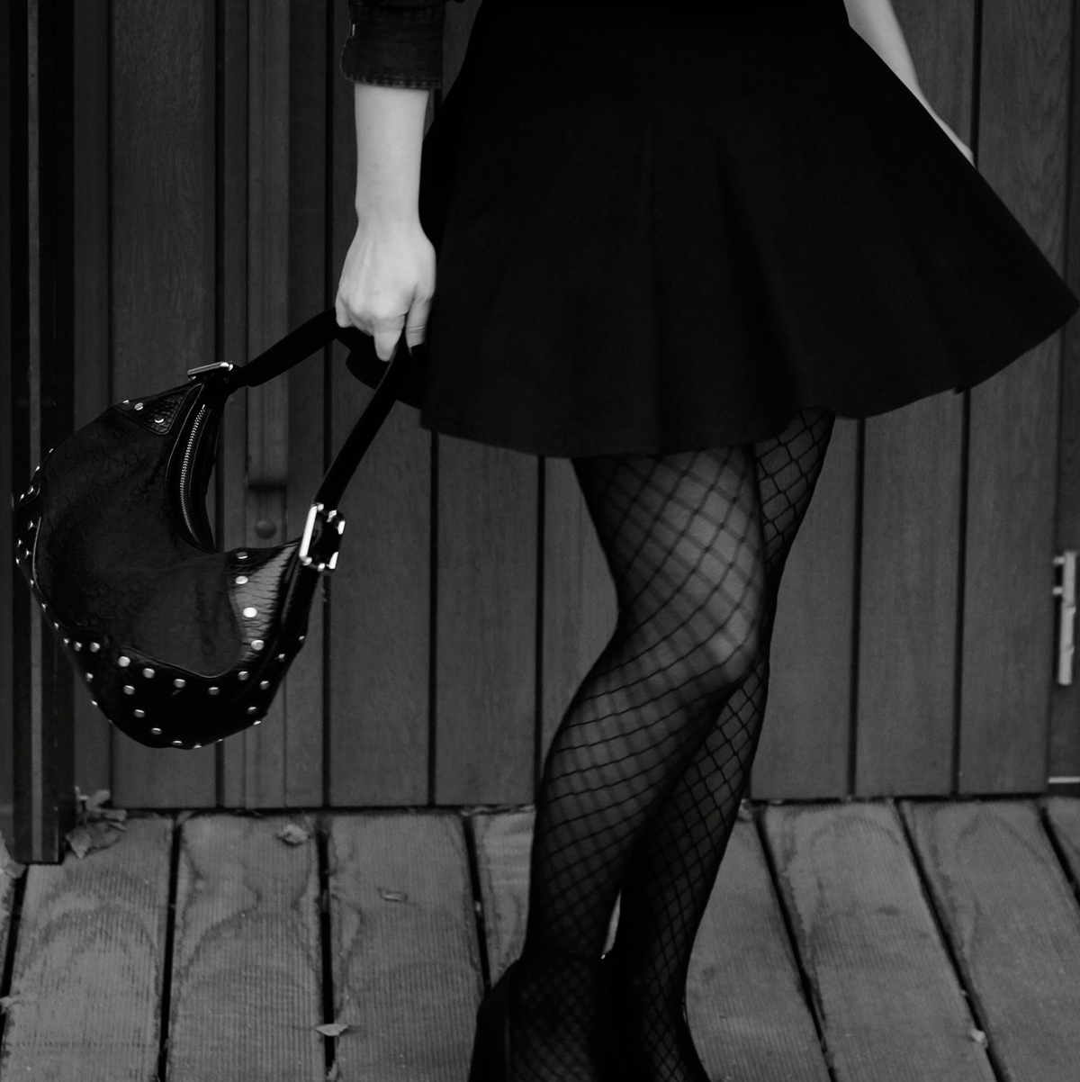 witch look, witch in the office, all black, fishnet stockings, donna karan bag, black skirt