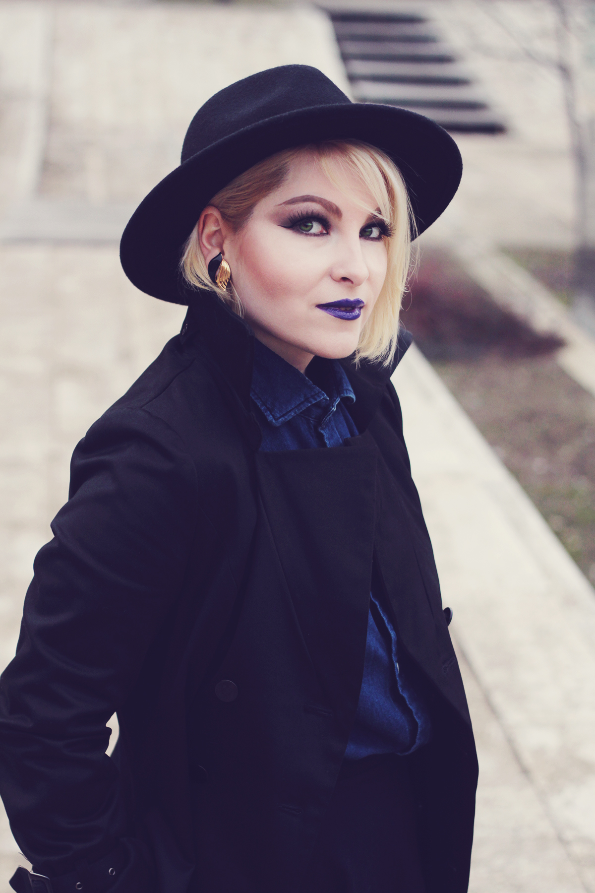 witch look, witch in the office, blue lips, all black, black trench coat, black hat, ralph lauren denim shirt, vintage earrings