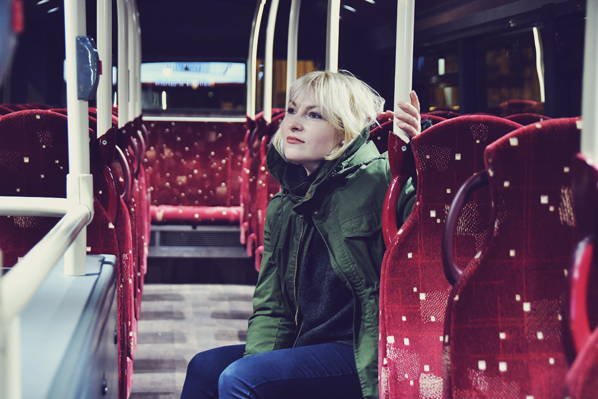 double decker bus, Edinburgh travel post, green parka and oversized sweater, travel style