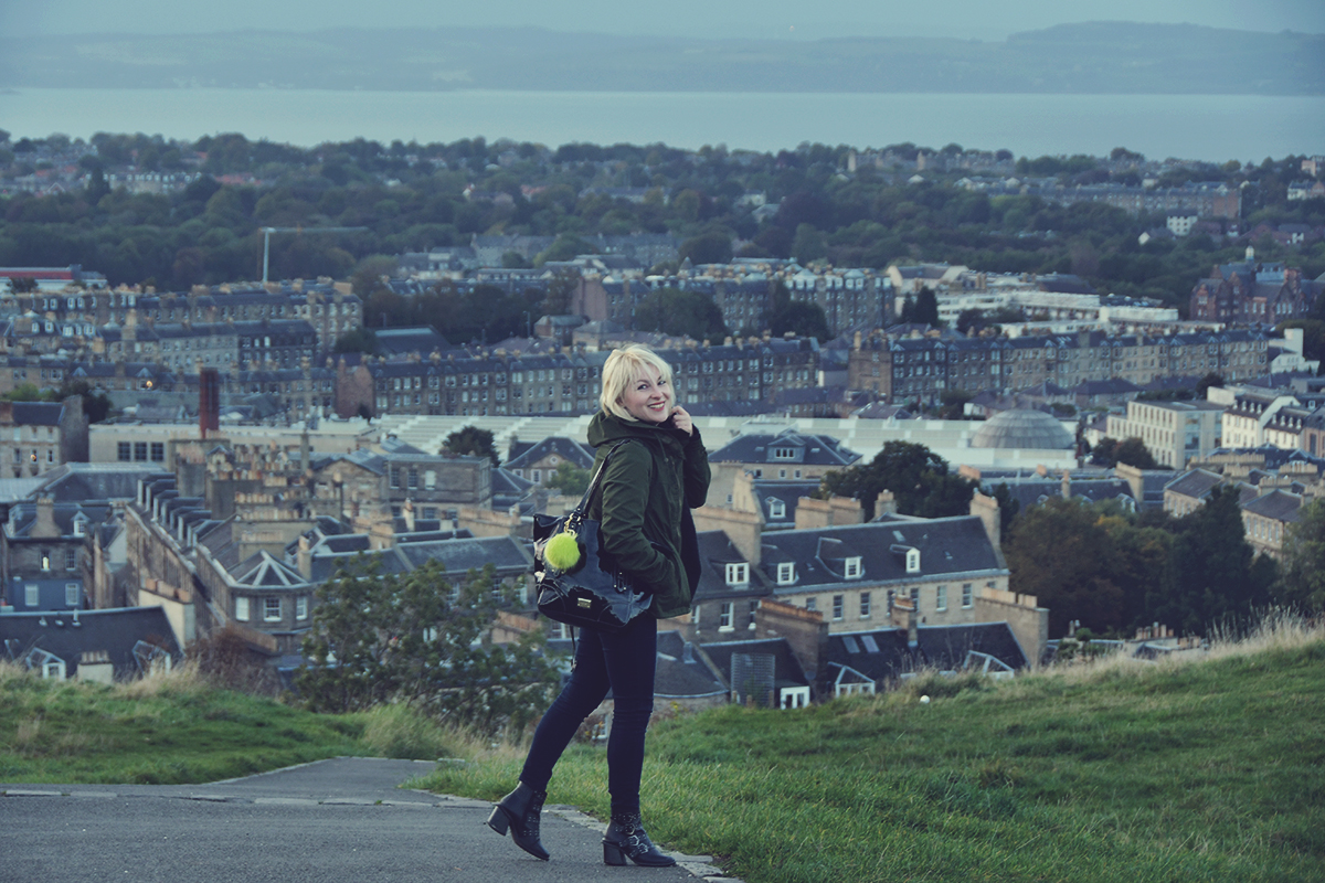 Edinburgh travel post, travel style, Zaful boots, jeans and green parka jacket, Nine West bag, view over Edinburgh