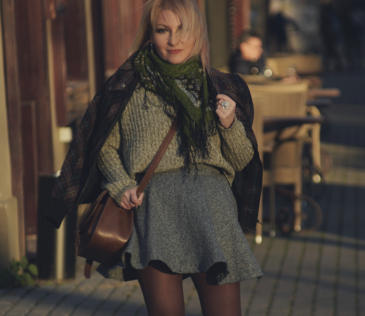 bomber jacket, sparkly earrings, green floral scarf, grey A-line skirt, green jumper, satchel bag, winter fashion, winter
