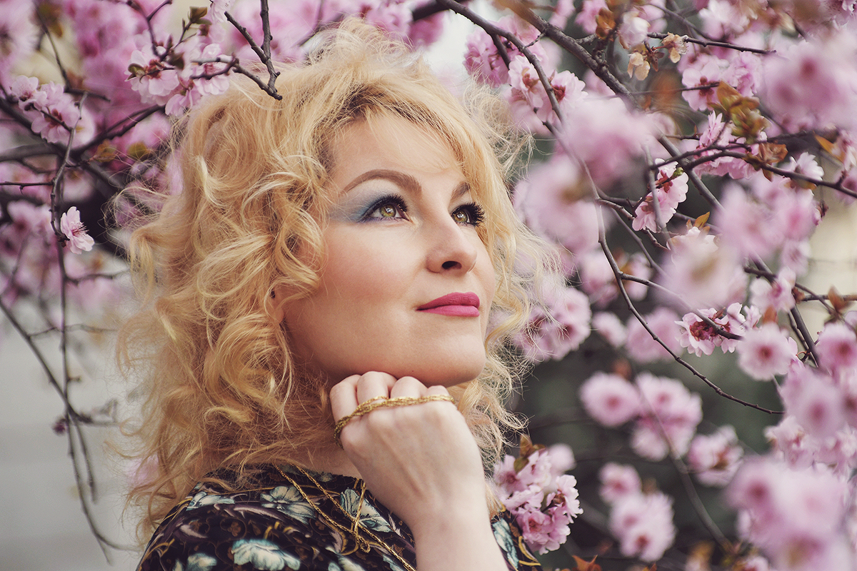 spring look, pink cherry blossoms, spring, spring make-up, curly blonde hair, floral top, Christian Dior necklace