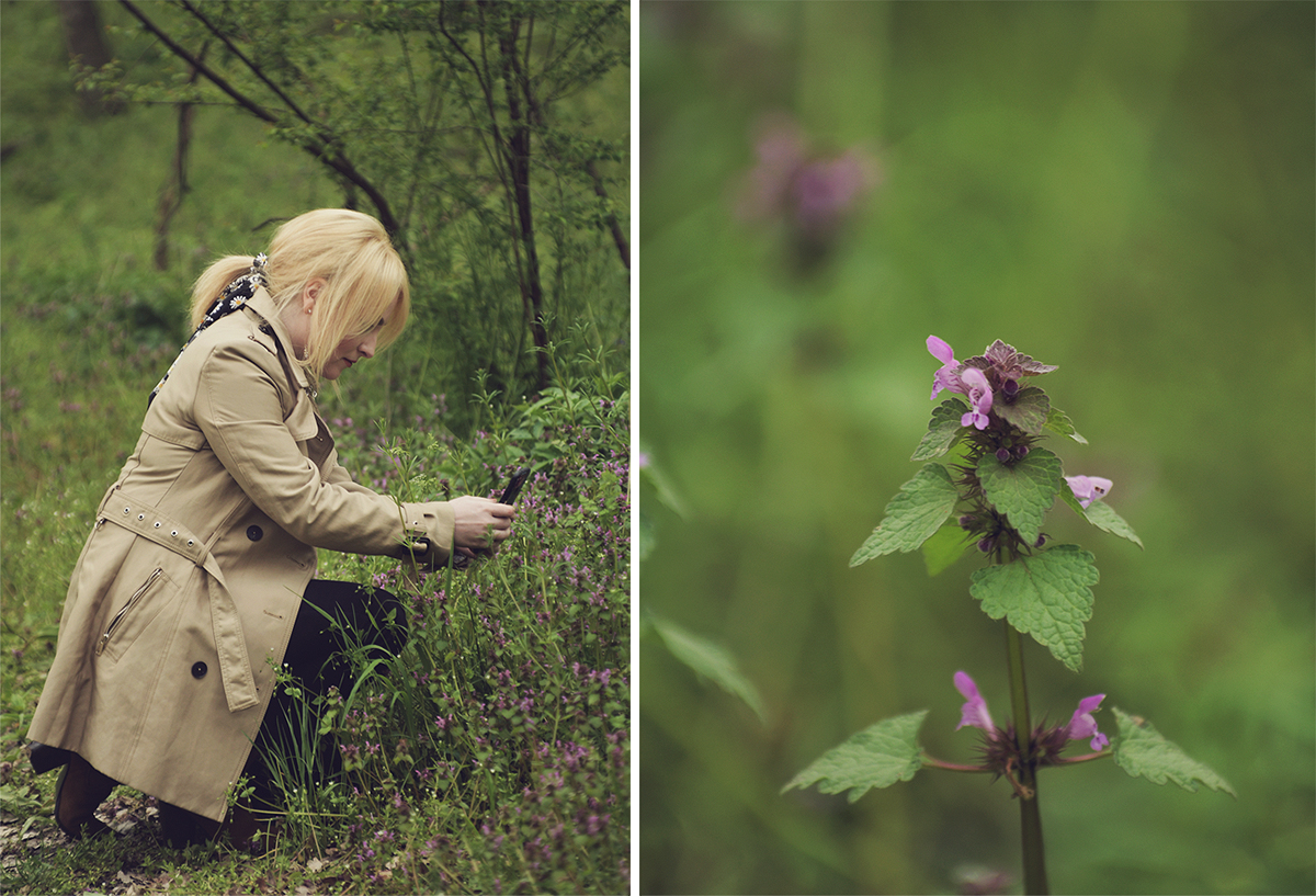 trench coat, jeans, suede boots, daisy print hair scarf, spring, spring look, into the woods, photographing a flower