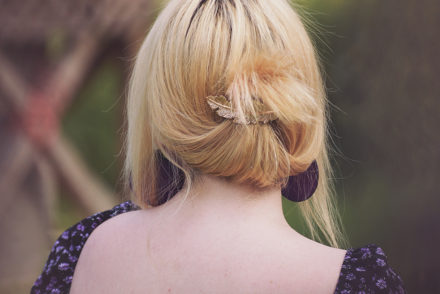 bohemian chic, boho hairstyle, blonde bohemian hair style, leaf hair clip, summer style, floral pattern dress, purple earrings