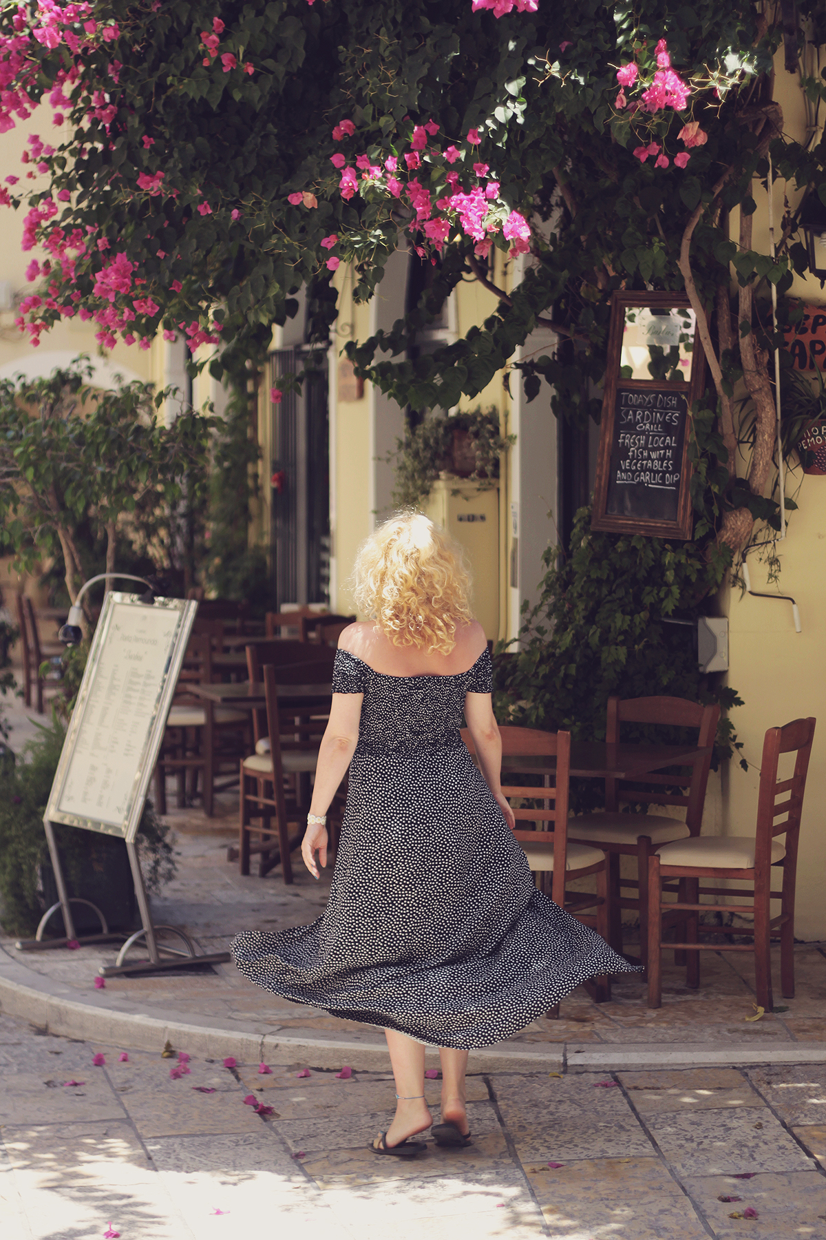 summer style, summer travel style, Greece, Corfu Town, black flip flops, off the shoulder maxi dress, curly blonde hair